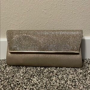White House Black Market Gold Clutch